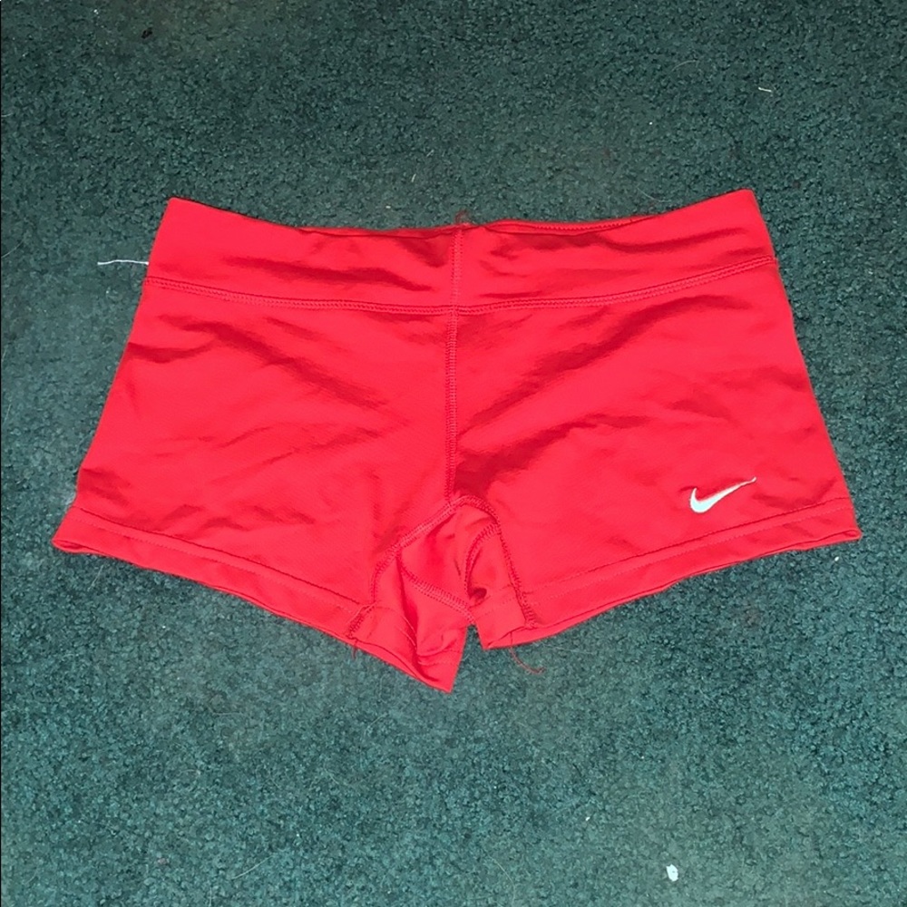 red nike shorts